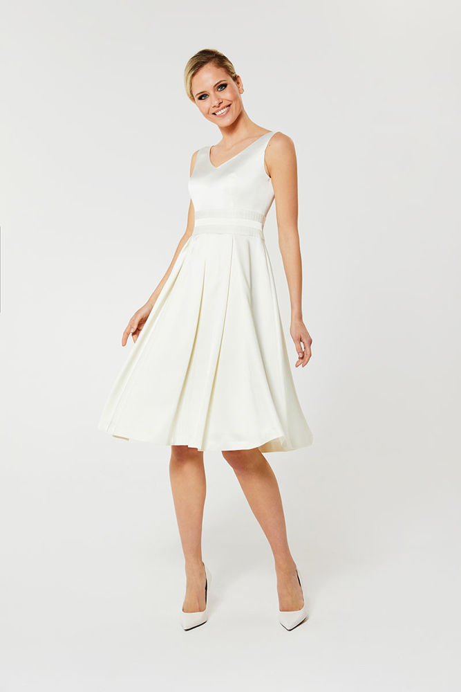Picture of Dress in heavy satin with a stylized bodice and pleated skirt ECRU