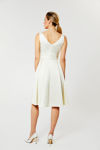 Picture of Dress in heavy satin with a stylized bodice and pleated skirt ECRU