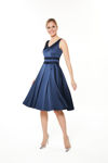 Picture of Dress in heavy satin with a stylized bodice and pleated skirt BLUE
