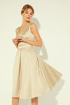 Picture of Dress in heavy satin with a stylized bodice and pleated skirt BEIGE