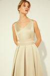 Picture of Dress in heavy satin with a stylized bodice and pleated skirt BEIGE