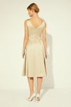 Picture of Dress in heavy satin with a stylized bodice and pleated skirt BEIGE